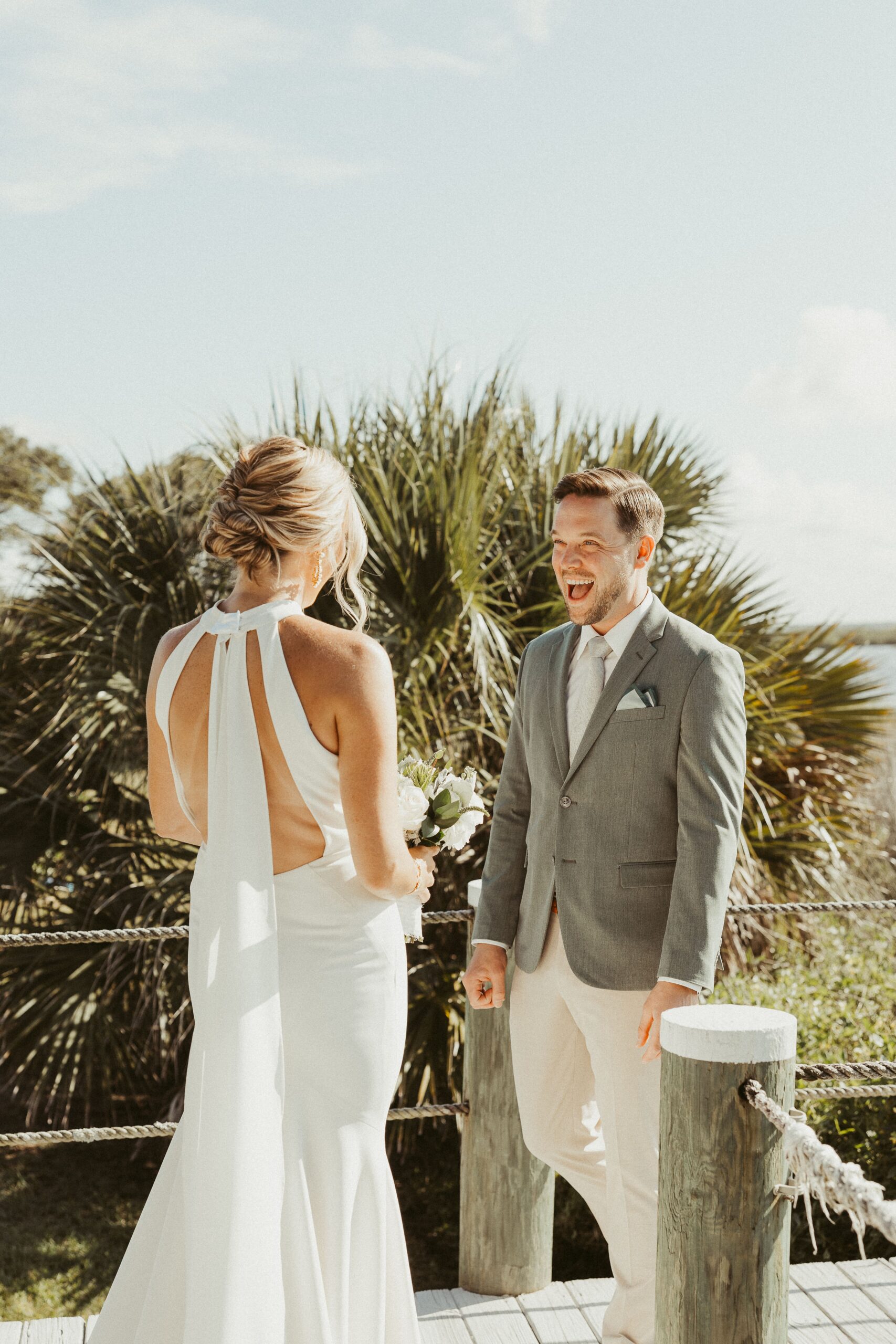 Intimate beach side wedding ceremony and first look