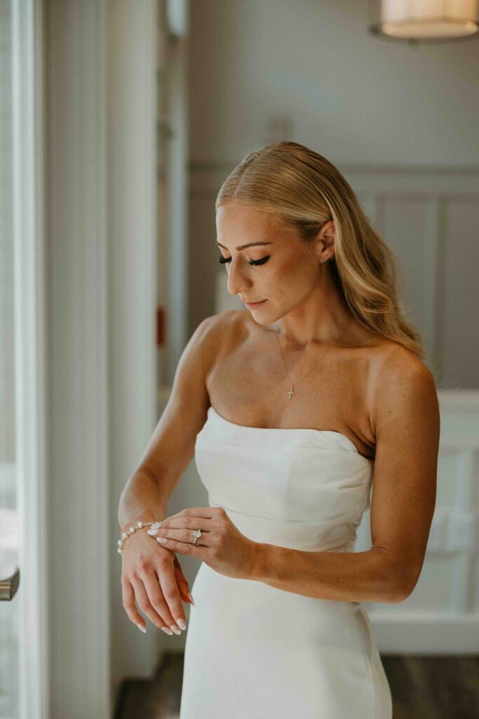 Bride getting ready at The Oaks Community Center.
