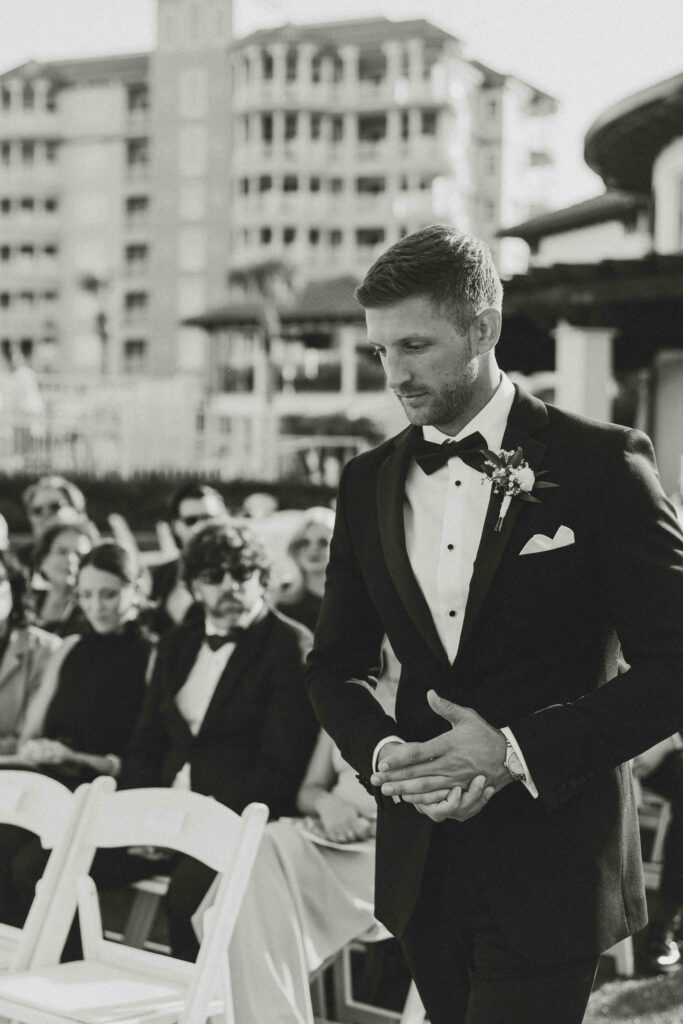 Groom walks down the aisle at ocean-front venue, Amelia Island Club.
