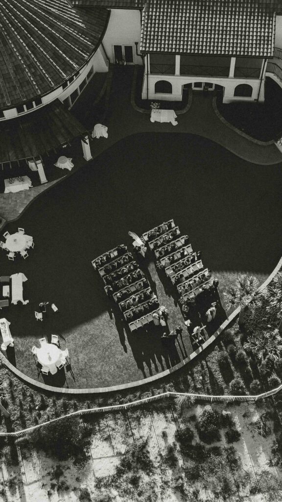 Drone view of Amelia Island Club wedding ceremony with ocean backdrop and coastal landscape